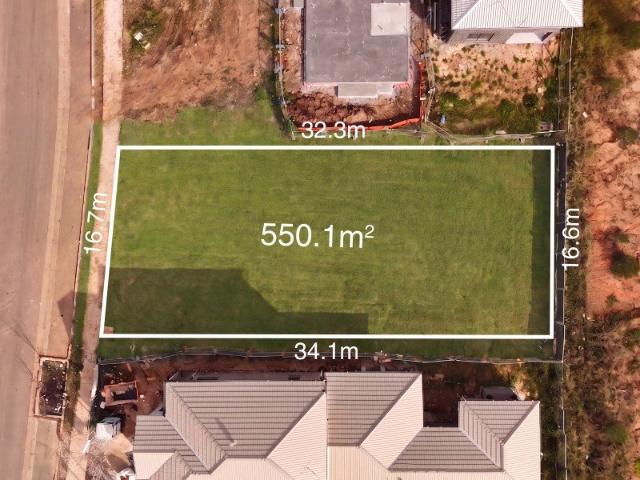 Registered Land with Duplex and Subdivision Potential in a Growing Community