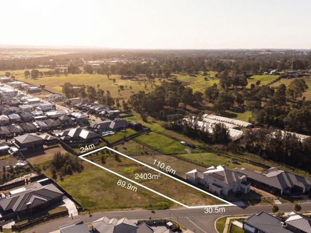 Registered Land with Potential for Duplex, Childcare Centre, and Subdivision