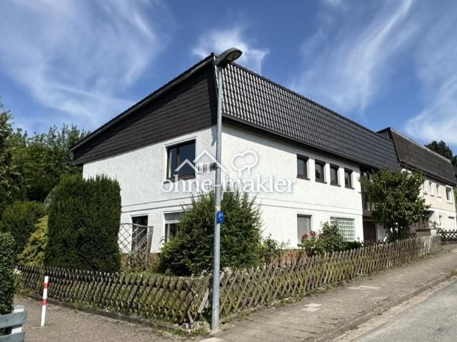 Reihenendhaus mit zusätzlicher Einliegerwohnung in familienfreundlicher Lage