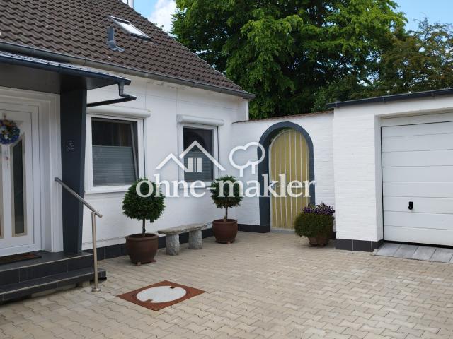 Reihenendhaus mit 560 m2 Grundstück, Garage & Terrasse