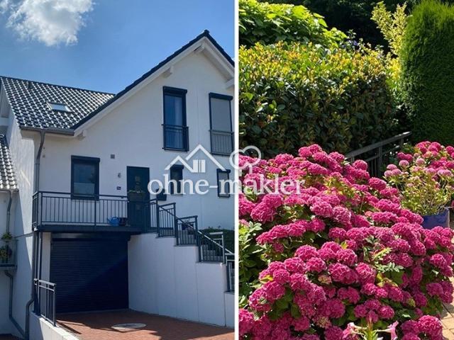 Reihenhaus im Doppelhausstil mit sonnigem Wintergarten