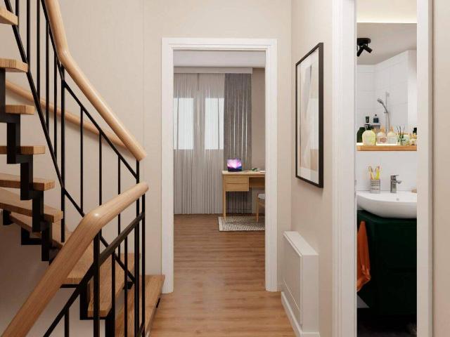 Reihenhaus im EH Standard 55 mit Terrasse, Dachterrasse und zwei PKW Stellplätzen