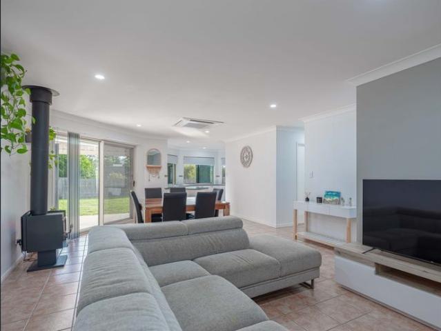 Relax and Entertain in This 3 Bedroom Brick Home with Pool