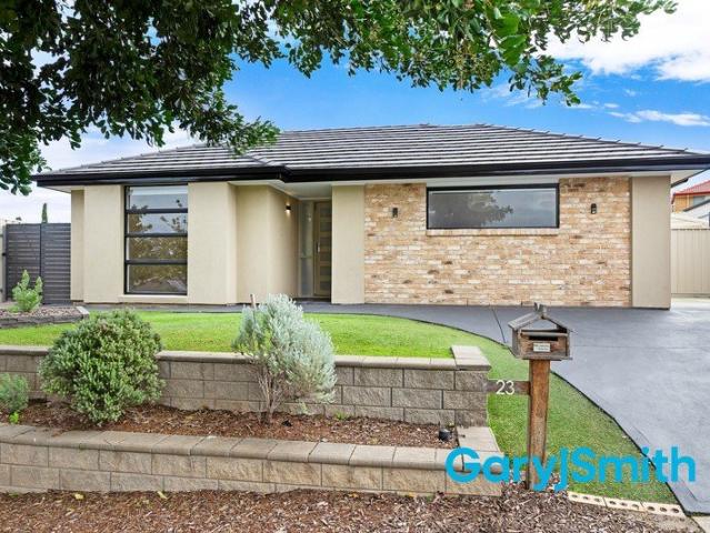 Relax, Entertain & Enjoy Modern Family Living Just Minutes from the Coast