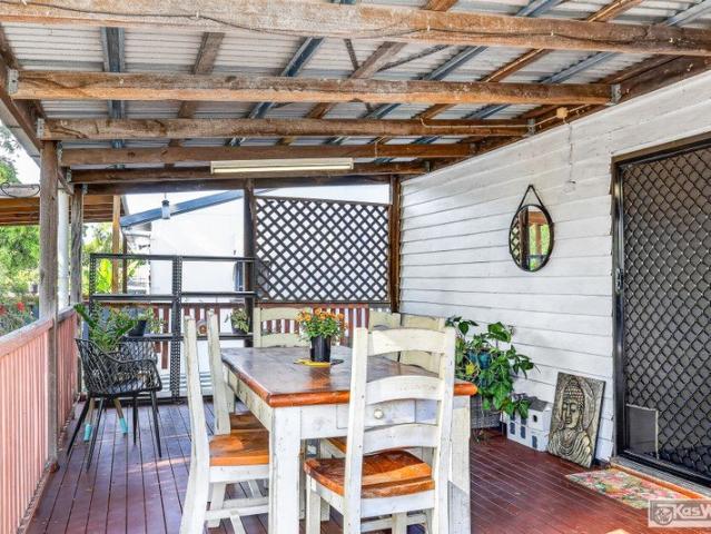 MOVE STRAIGHT IN! 4 BEDROOMS. TIMBER DECK. BACK LANE ACCESS
