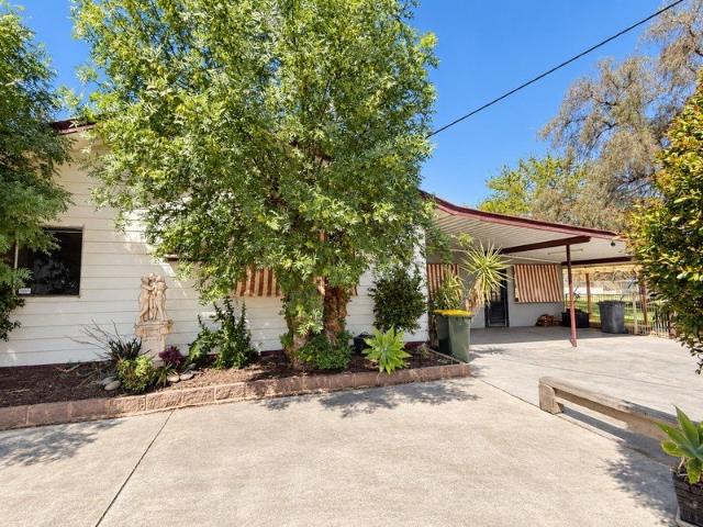 Relaxed Acreage Living, Generous Shedding and a Poolside Escape