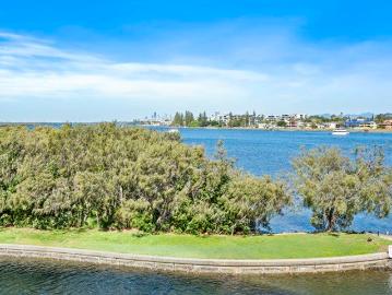 Relaxed Coastal Living with Stunning Broadwater Views and Additional Family Room!