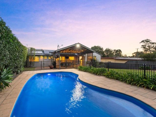 Relaxed Family Living with an Incredible Backyard & Space to Grow