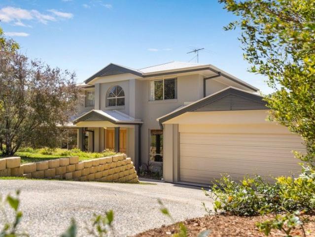 Relaxed Family Living with Study, Lush Outlooks & Creekside Position on 1112sqm