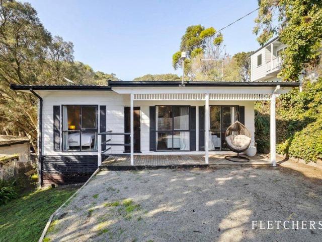 Relaxed Turn Key coastal living with privacy and charm