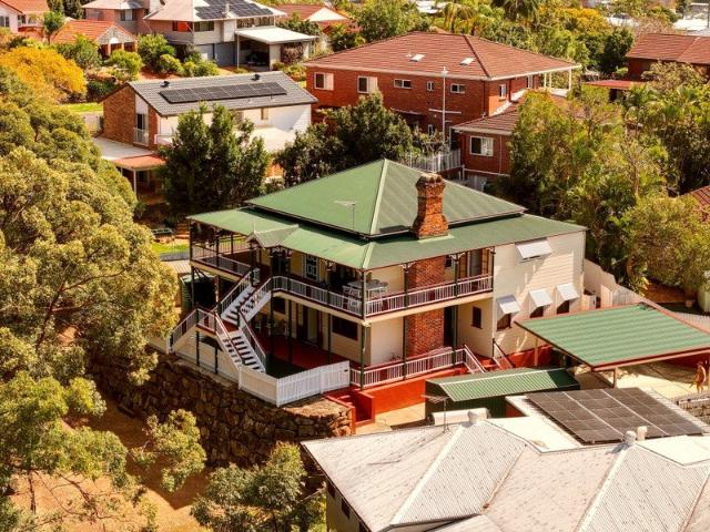Replica Colonial Home Sitting Atop One of Carina's Highest Points