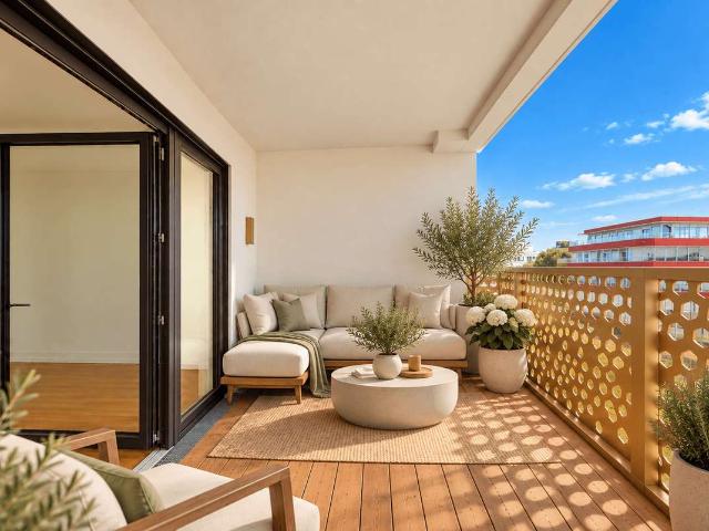 Repräsentative 2 Zimmer Neubauwohnung mit großem Südwest Balkon in Premium Lage