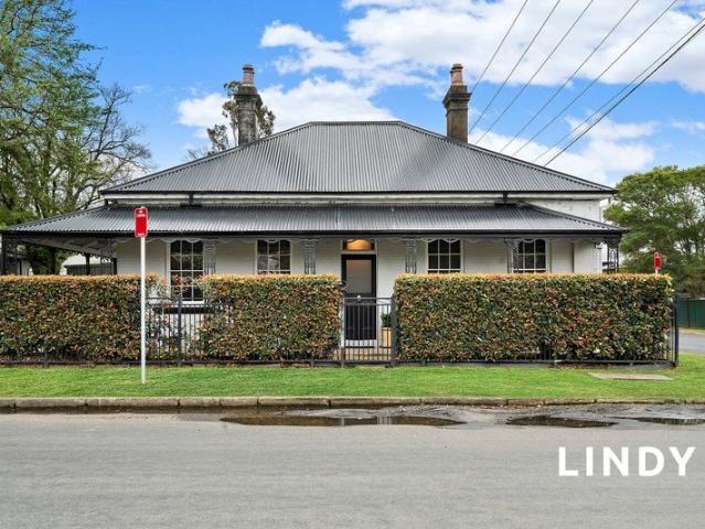 RESTORED CHARACTER HOME IN PRIME TOWN LOCATION