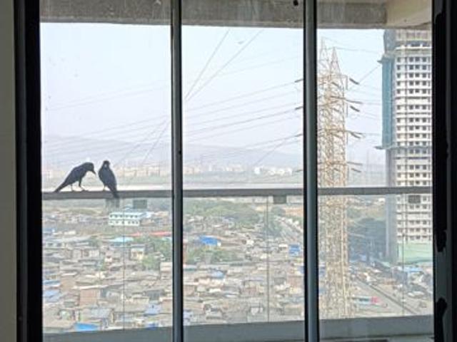 Resale | 2.5 BHK + Prayer Room,Servant Room 806 Sq.Ft. Apartment in Neumec Shreeji Towers