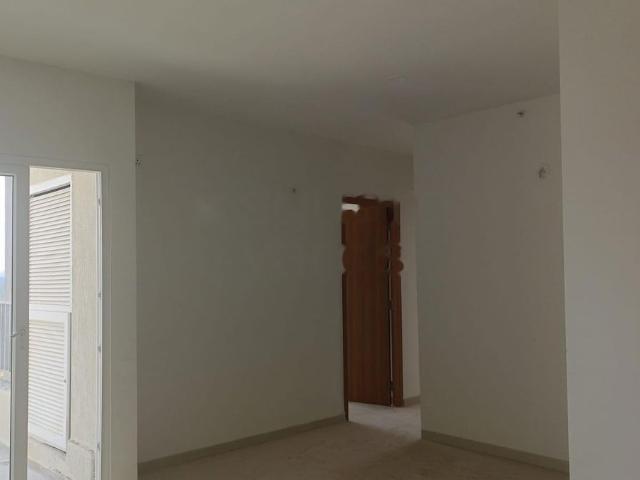 Resale | 2 BHK 1008 Sq.Ft. Apartment in Ajmera Lugaano