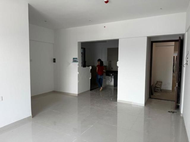 Resale | 2 BHK 979 Sq.Ft. Apartment in Raga Top Towers