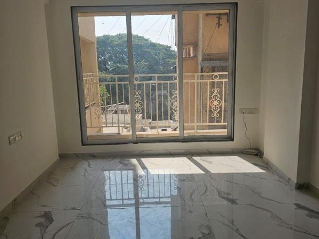 Resale | 2 BHK + Servant Room 630 Sq.Ft. Apartment in Atharva CHS Charai