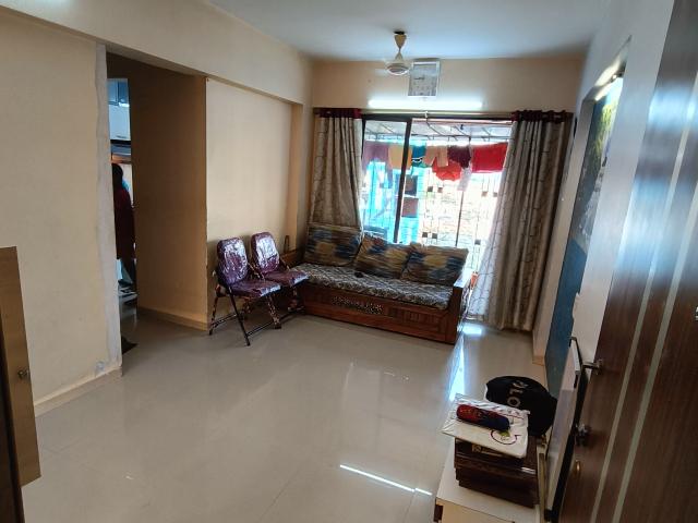 Resale | 2 BHK + Servant Room 630 Sq.Ft. Apartment in Unnati Woods CHS