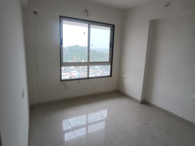 Resale | 2 BHK + Pooja Room 730 Sq.Ft. Apartment in Ajmera Crosstown One