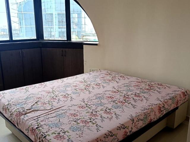 Resale | 2 BHK + Pooja Room 890 Sq.Ft. Apartment in Raheja Reflections II