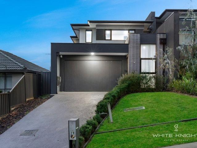 BACKING ON TO RESERVE, A TRENDY HOME WITH 2 MASTER BEDROOMS & DOUBLE GARAGE!