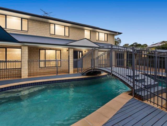 Resort Inspired Family Living with a Front Pool & Exceptional Entertaining