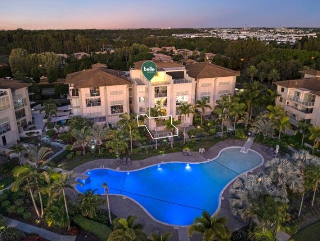Resort Living Hope Island Gem: Ground Floor Waterfront Apartment with Terrace
