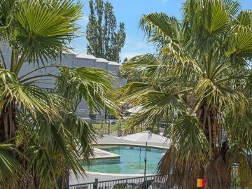 Resort Style Coastal Townhouse Just 200m to Corrigans Beach with Views towards the Pool