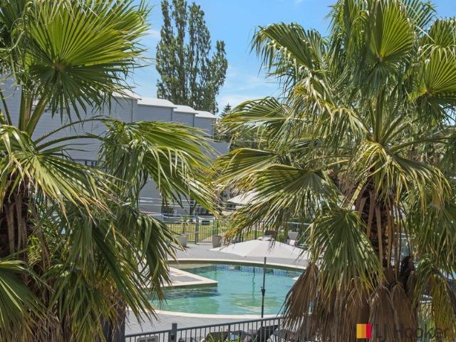 Resort Style Coastal Townhouse Just 200m to Corrigans Beach with Views towards the Pool