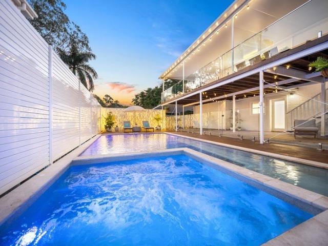 RESORT STYLE, COASTAL ELEGANCE, ELEVATED, VIEWS. NO COMPROMISE ON LUXURIOUS DETAIL 13m DECK! THIS IS BLI BLI LIVING AT ITS FINEST! 6 MINS TO BEACH