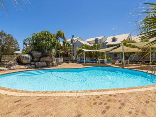 Resort Style Coastal Living with Pool Views, Ocean Glimpses & Stunning Sunsets!
