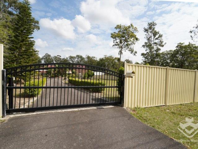 Resort Style Acreage Living with Pool, Shed & Endless Space