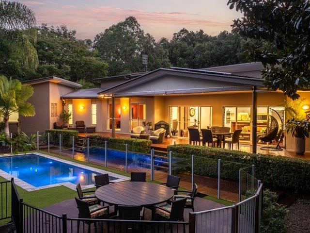 RESORT STYLE ACREAGE LIVING WITH RARE FLAT LAND, ULTIMATE PRIVACY & FUTURE POTENTIAL