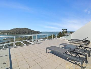 Resort Style Beachside Apartment with Expansive Panoramic Water Views