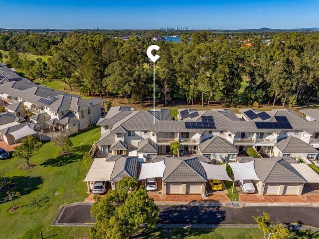 Resort Style Golf Course Living in Prestigious Hope Island Resort