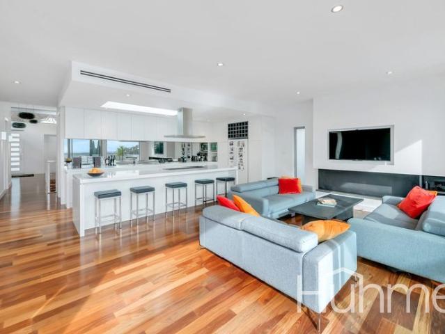 Resort Style Executive Living with Stunning City & Coast Views