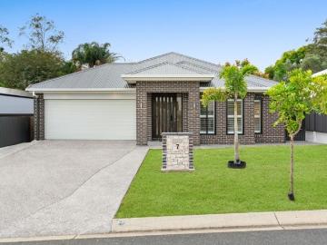 Resort Style Family Living with Multiple Living Areas & Stunning In Ground Pool