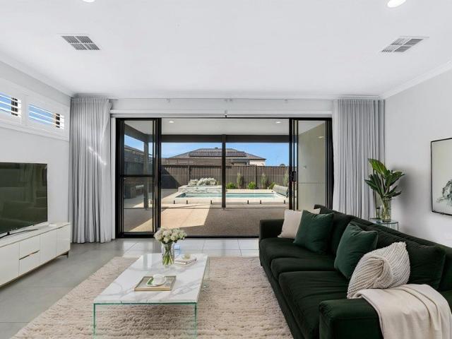 Resort Style Family Living with a Pool and Spa