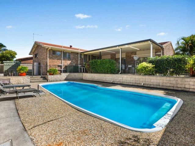 Resort Style Family Living with Pool Room, Bar & Outdoor Oasis