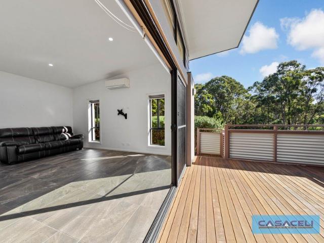 Resort Style Home in the Bermagui Township with your own private Warehouse + Approved plans for an additional 2 x Story Home if Needed