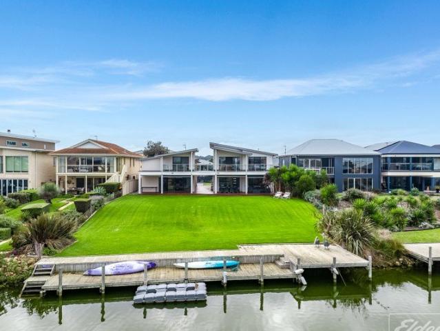 Resort Style Living over 2 Titles with Extensive Shedding
