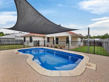 Resort Style Living in a Quiet Family Friendly Enclave