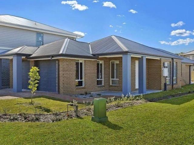 Resort Style Living in the Exclusive Kooindah Waters Golf Estate