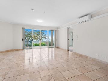 Resort Style Waterfront Living in a Prestigious Boutique Complex