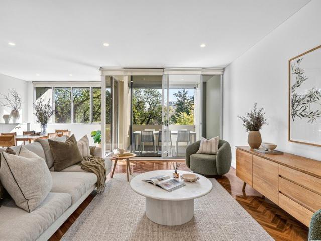 Retreat to the best of both worlds in a secure apartment with leafy views & East End energy