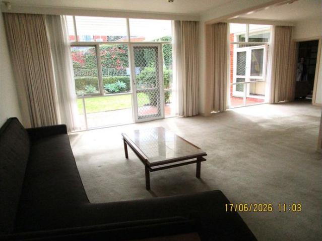 Retro with Style SINGLE LEVEL HOME with an abundance of features & beautiful garden surrounds