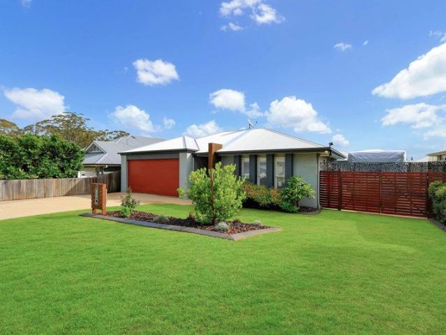 REVEALING the one with a HEATED POOL and BUTLER'S PANTRY and DOUBLE GARAGE and SHED and open CARAVAN SPACE in the best pocket of Kearneys Spring