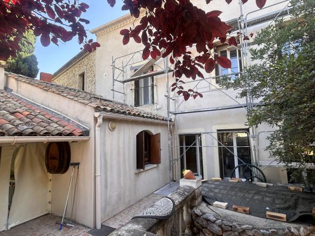 Rez de jardin avec grand garage
