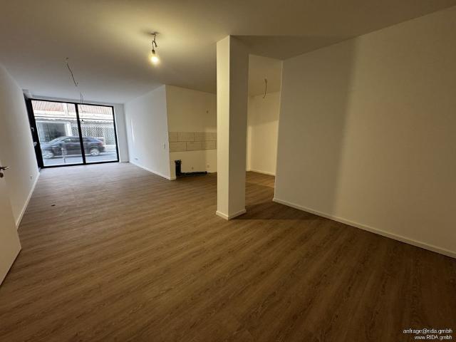 Welc H ome® by RIDA FLATS – Lichtdurchflutete EG Wohnung mit großen Fensterfronten & Toplage