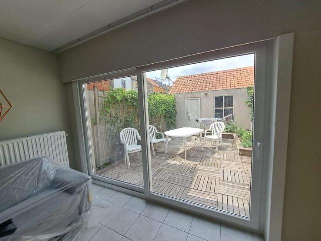 Rijhuis met zonnig tuinterras nabij De Porre